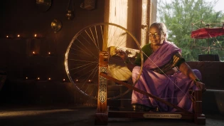 Weaver at the spinning wheel